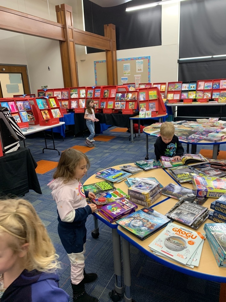 Pre school exploring the books!