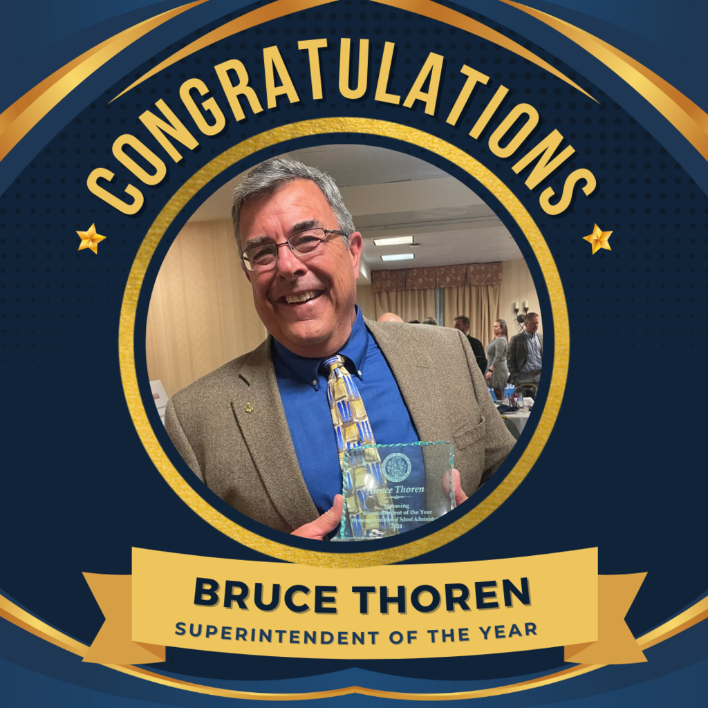 Picture of Bruce Thoren with his Superintendent of the Year Award